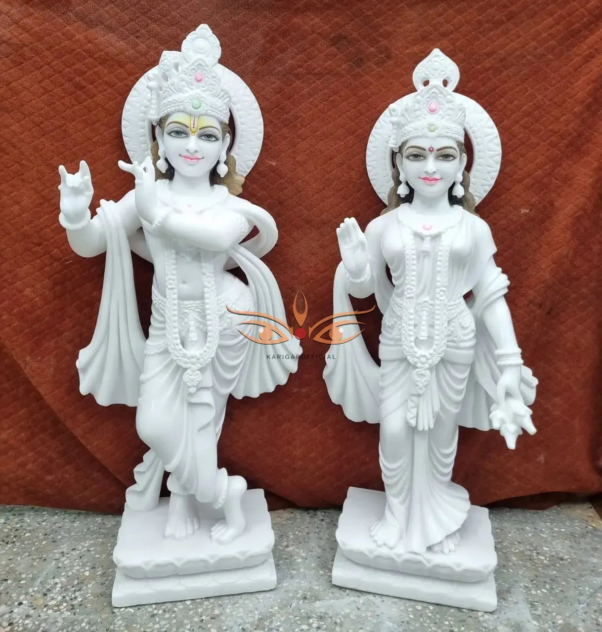 Collection of Krishna marble statues in gold leaf and multicolor