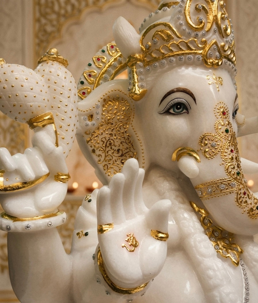 Golden Ganesha Marble STatue studded with embose gold leaf work and stone studded jewellery work in 24 inches large murti