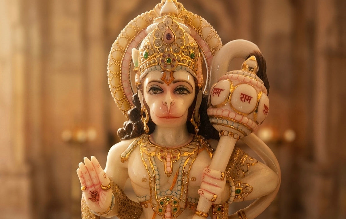 Large Hanuman ji marble statue adorn with heavy gold leaf work and stone jewelery in blessing position.